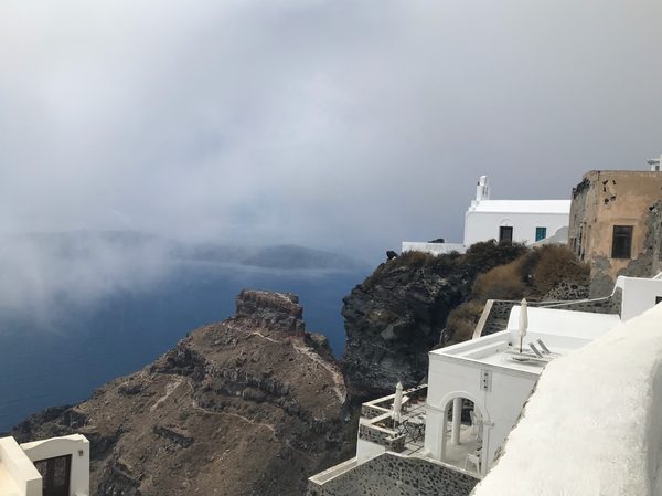 The caldera footpath between Fira and Imerovigli with Skaros rock formation ahead
