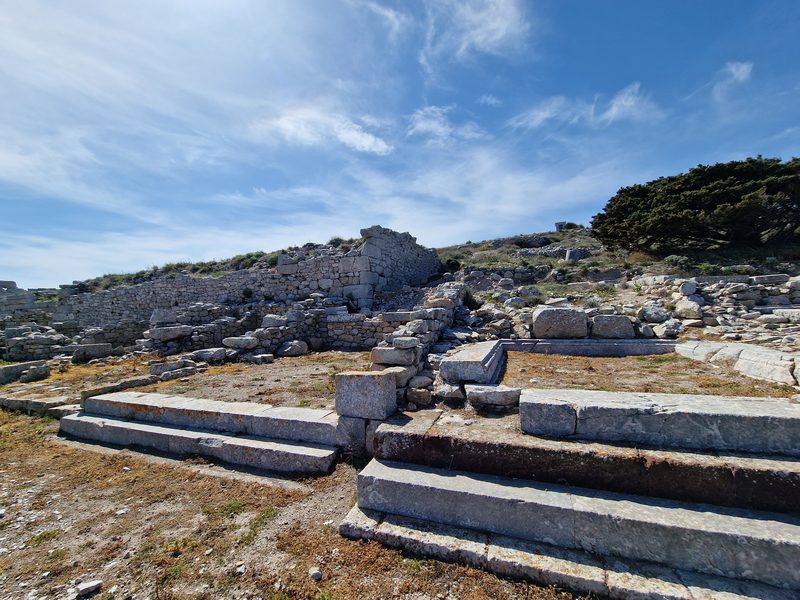 Column stumps and low stone walls among the excavated ruins at Ancient Thera