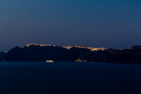 View of Fira town from Akrotiri, showing Santorini's caldera rim